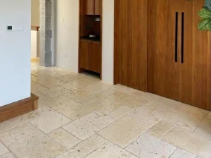 german beige limestone flooring with mixed size beige tiles in residential interior