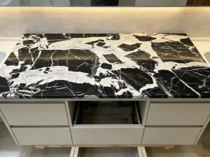 grand antique marble vanity top with black and white breccia texture