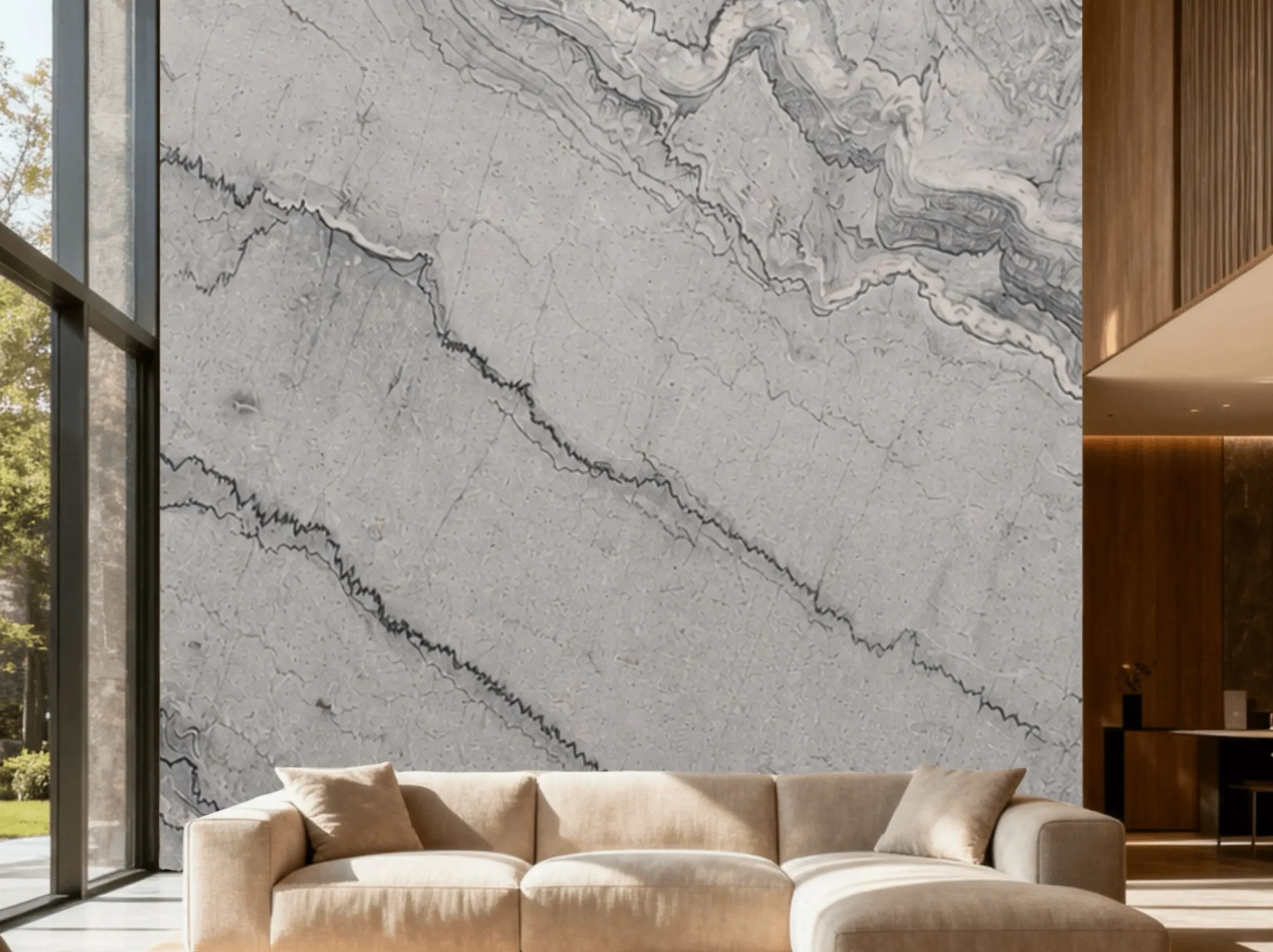 gray-bruce-marble-living-room-feature-wall-02.webp gray bruce marble living room feature wall with soft grey tones and dark wavy mineral movement