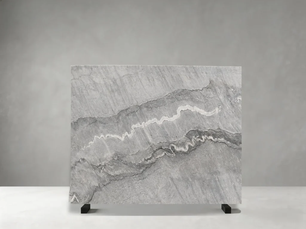 gray bruce marble slab with layered grey white bands and flowing natural stone pattern