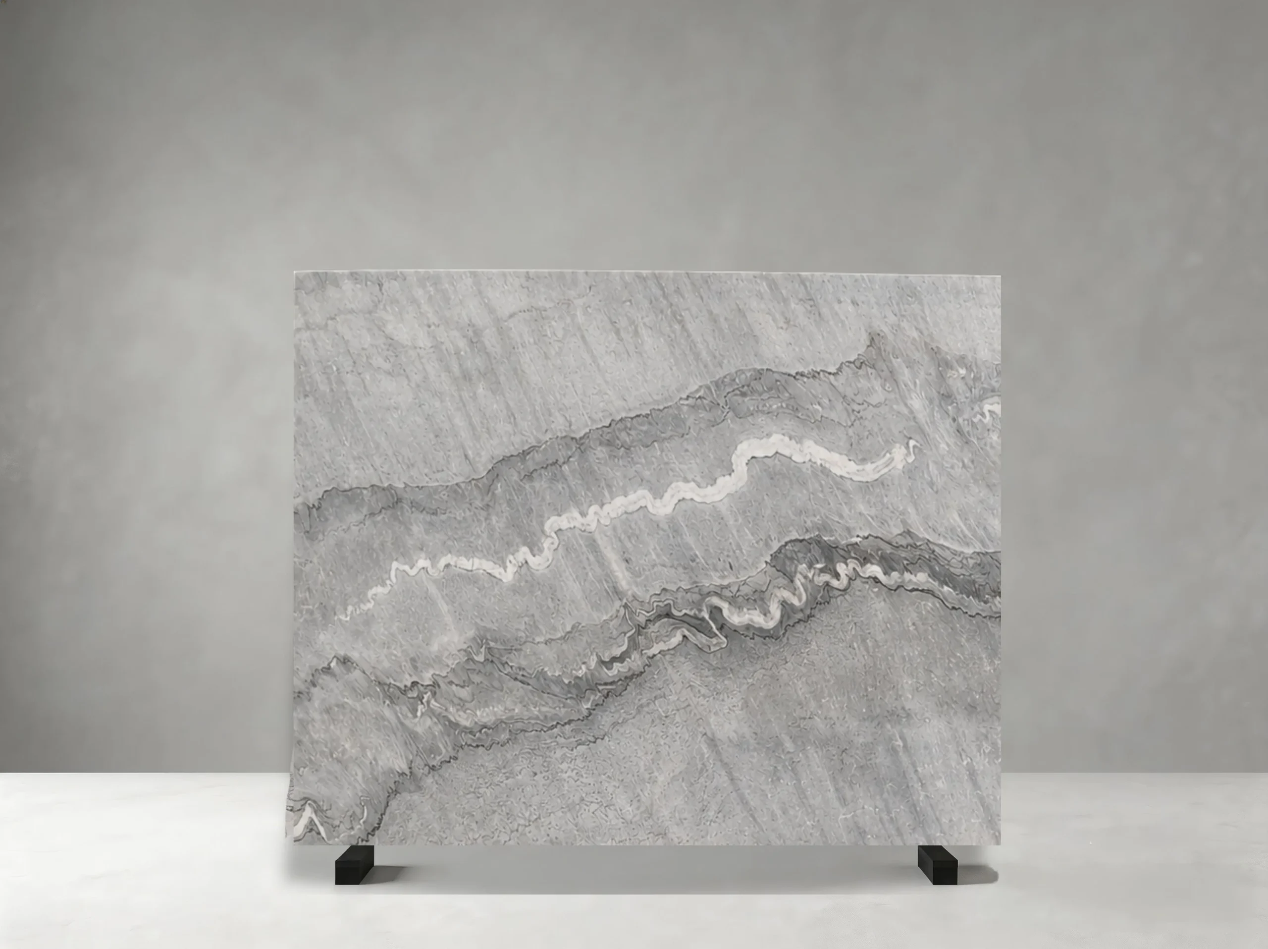 gray-bruce-marble-slab-layered-grey-pattern-05.webp gray bruce marble slab with layered grey white bands and flowing natural stone pattern