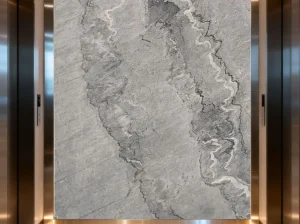 grey bruce marble elevator feature wall with layered grey mineral movement and white veining