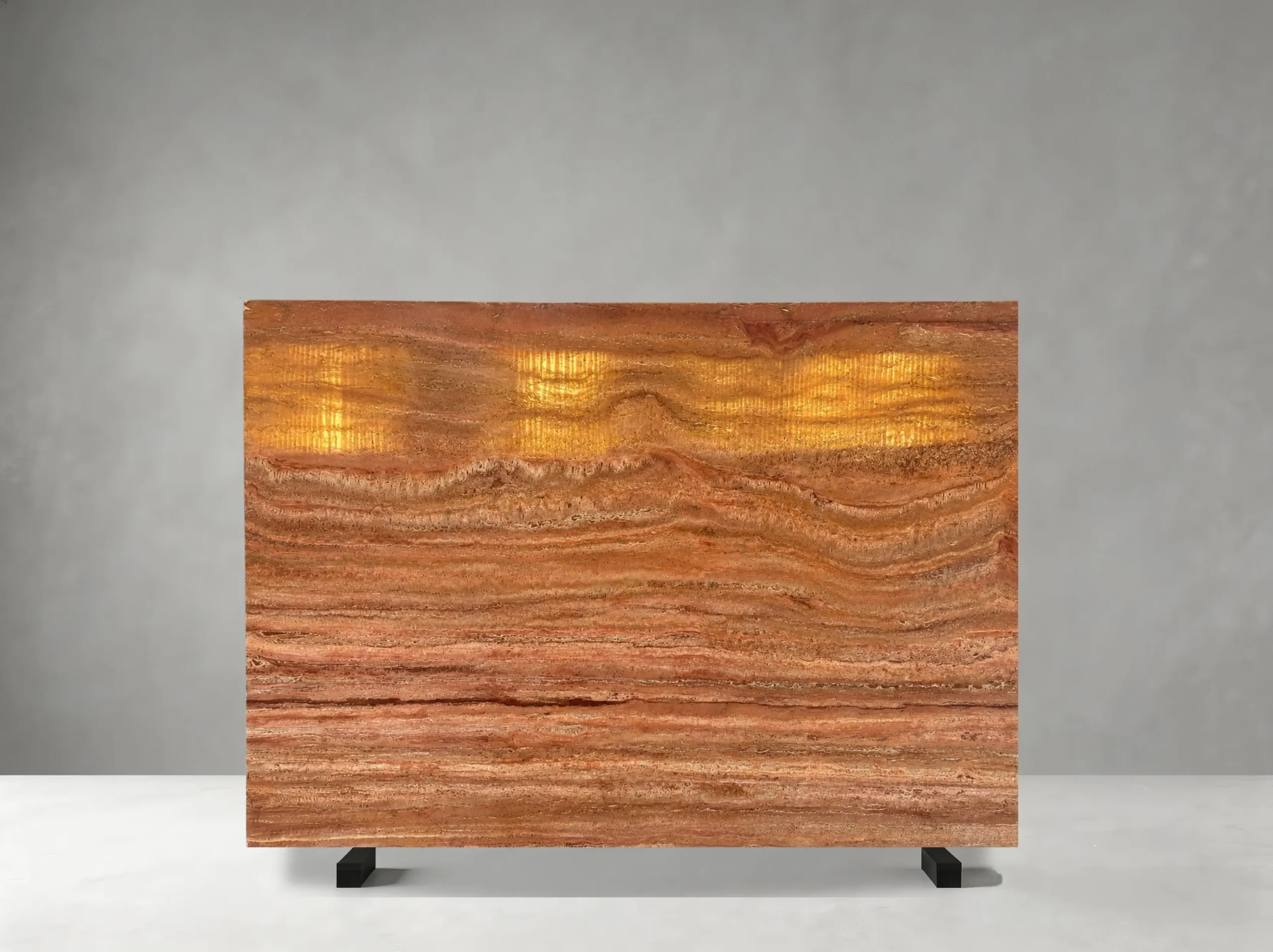 iran-red-travertine-backlit-slab.jpg Backlit Iran Red Travertine slab with glowing amber mineral layers