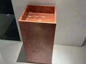 Iran Red Travertine freestanding pedestal basin with warm red tones