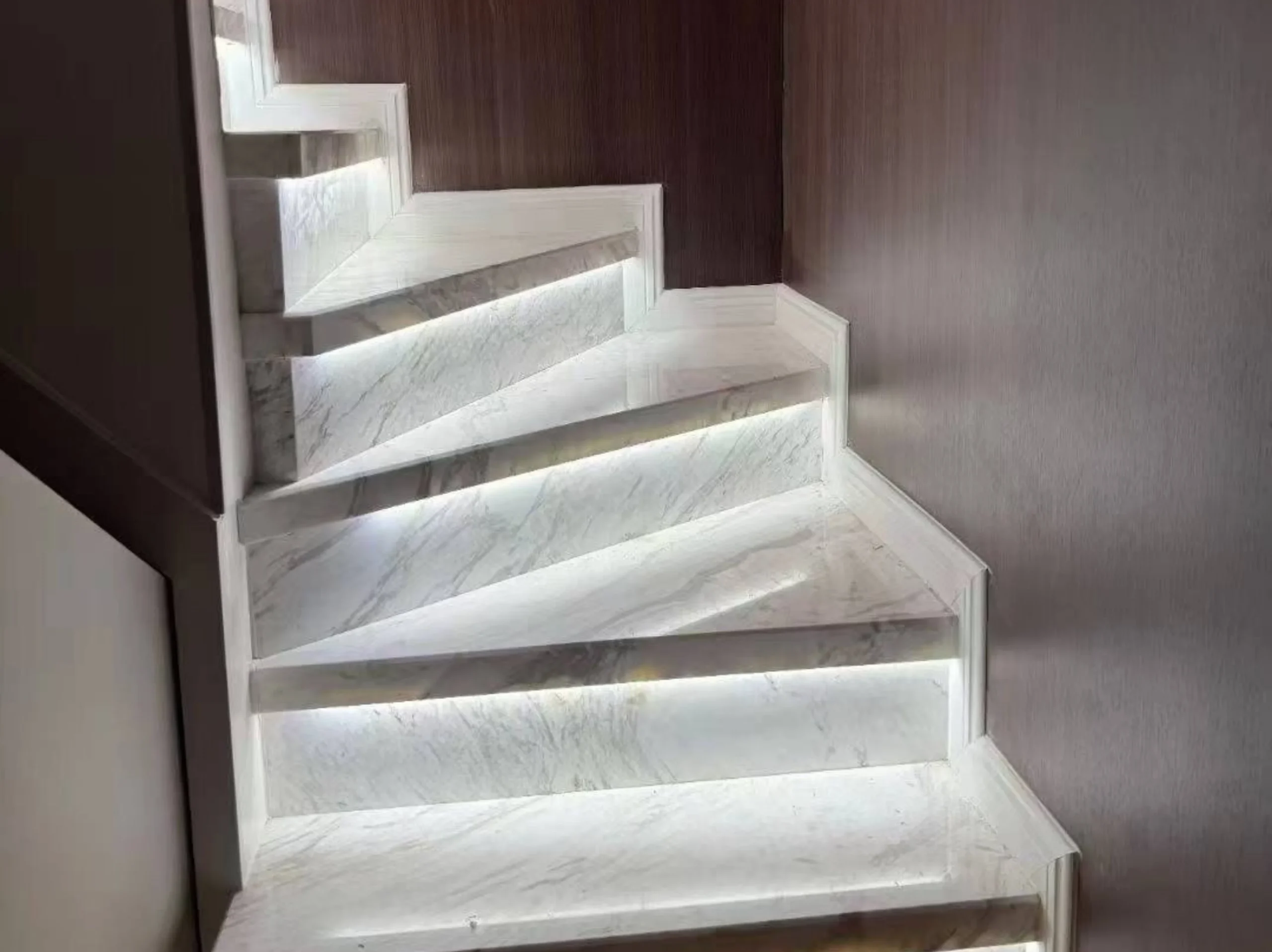 jazz-white-marble-illuminated-staircase.webp Illuminated Jazz White Marble staircase with custom treads and risers