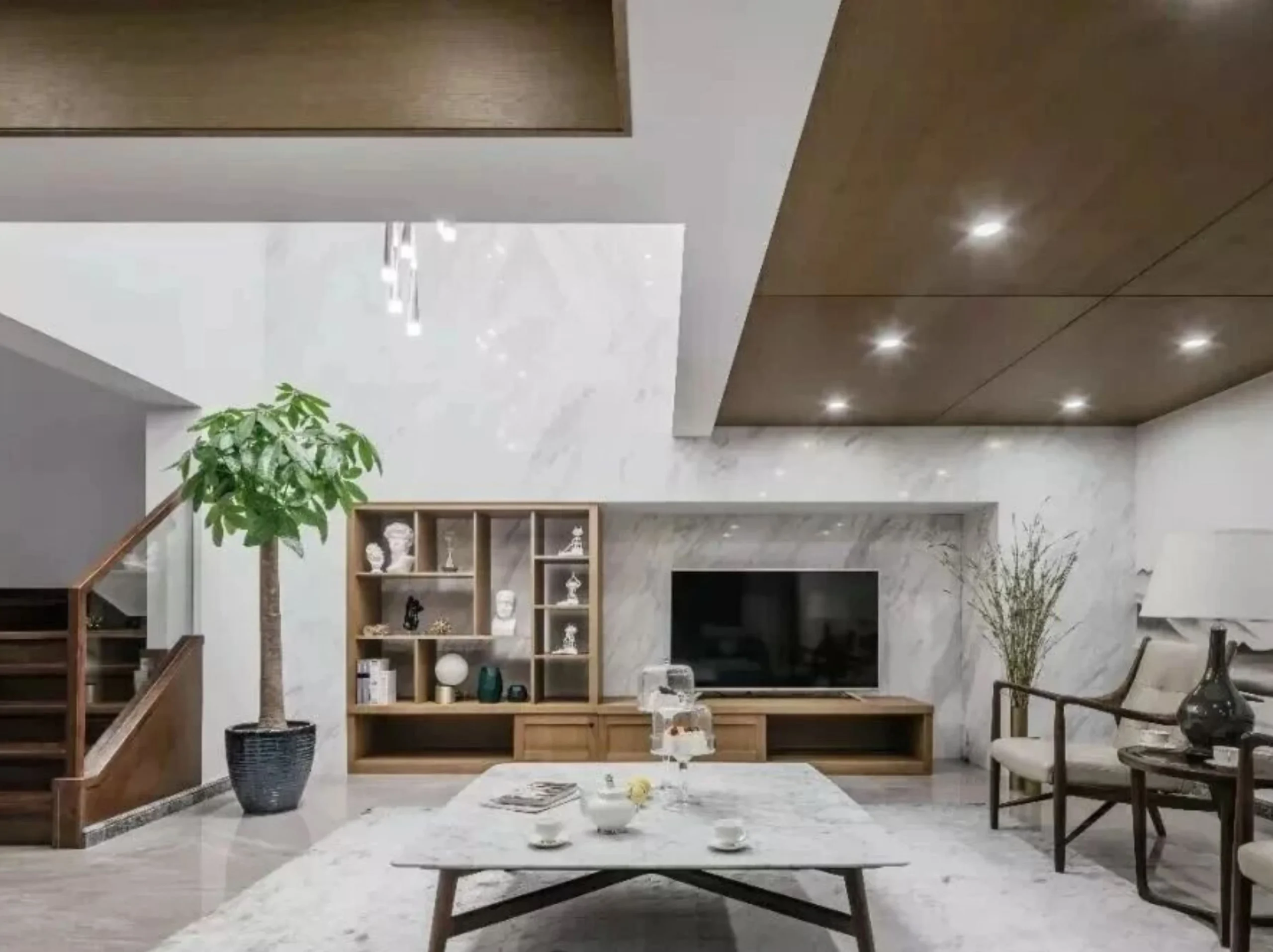 jazz-white-marble-luxury-living-room.webp Luxury living room with Jazz White Marble flooring feature wall and table top