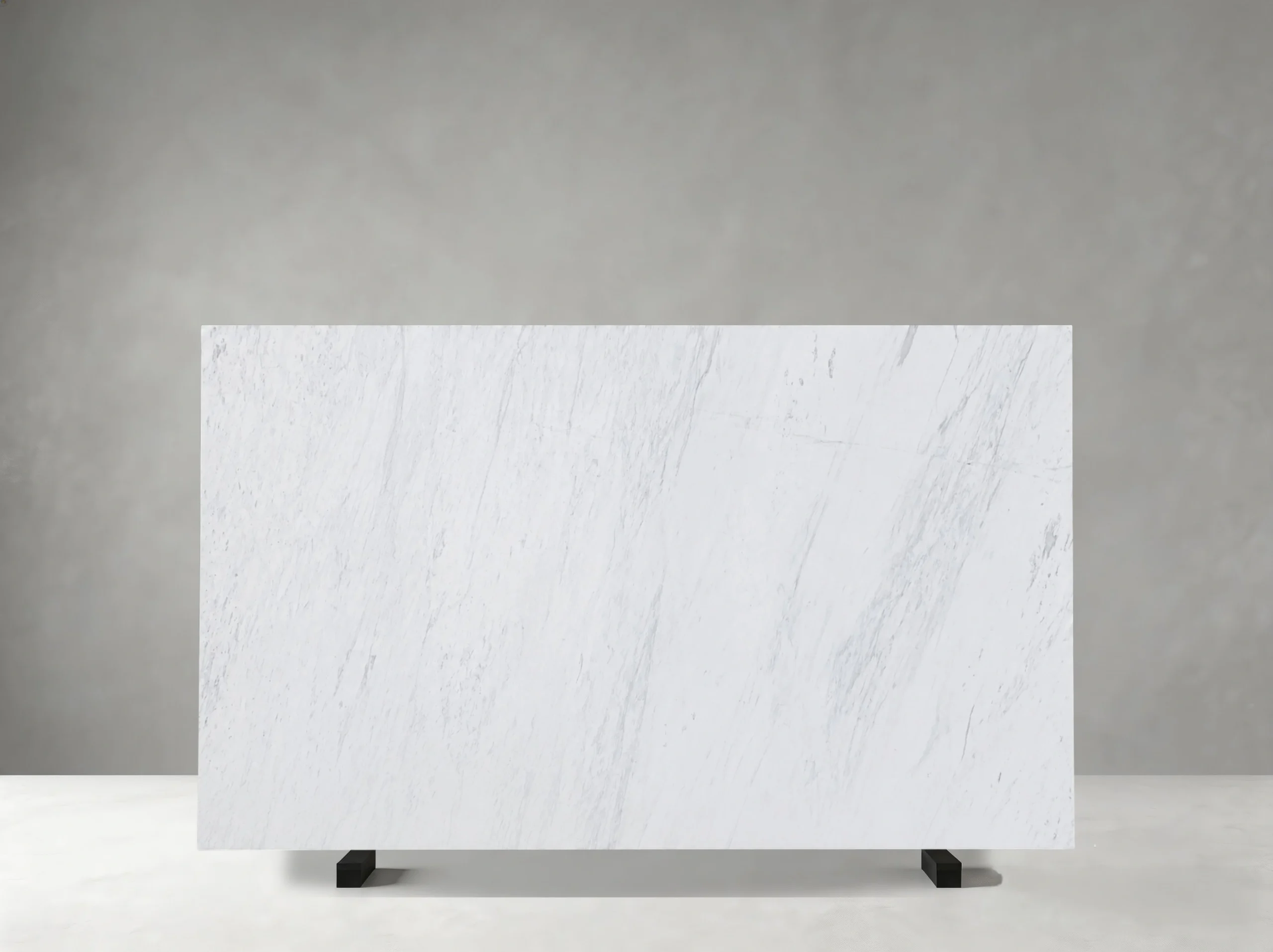 jazz-white-marble-soft-veining-slab.webp Jazz White Marble slab with soft grey veining and natural tonal variation