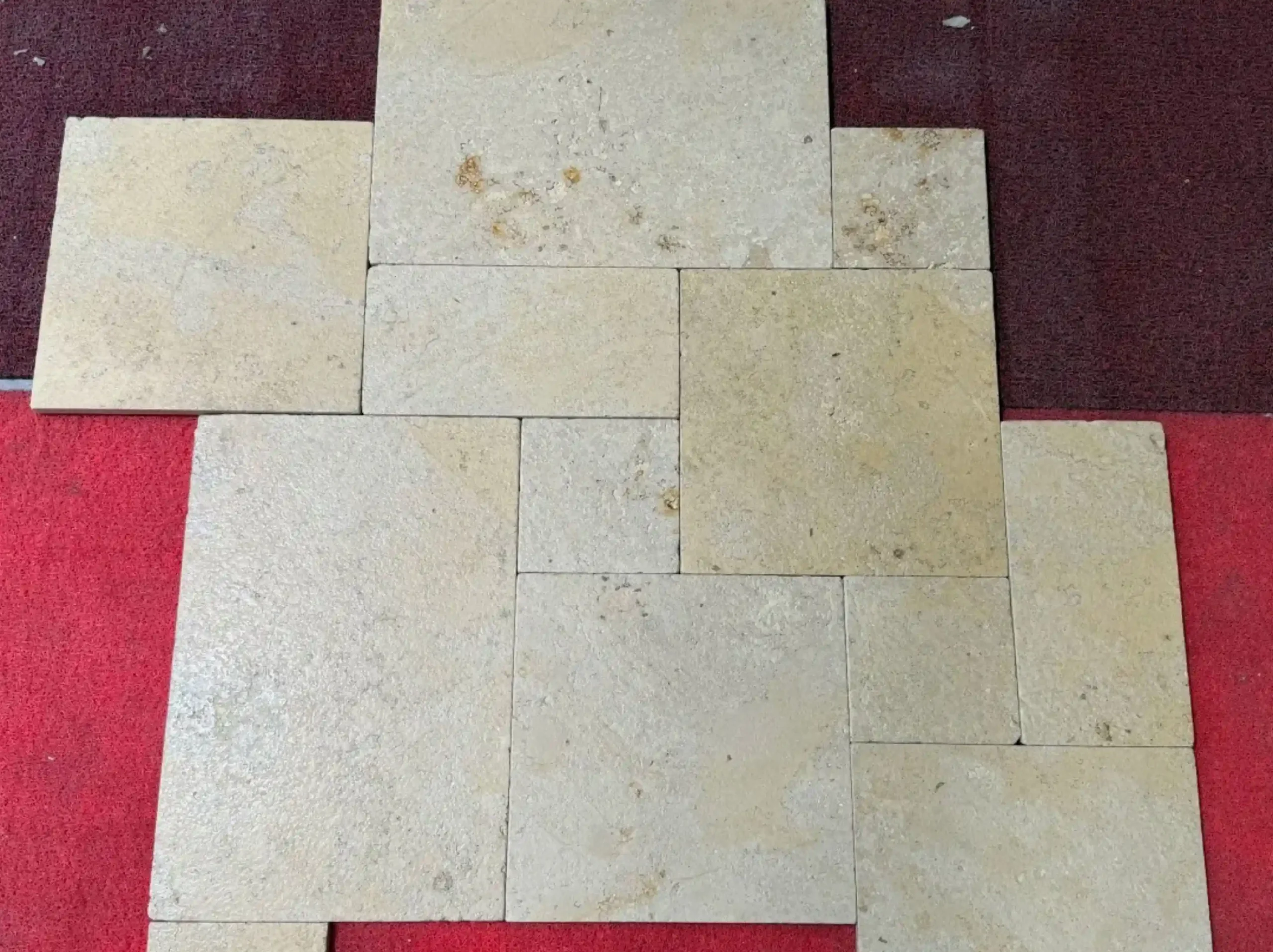 jura-beige-limestone-mixed-size-tile-layout-03.webp jura beige limestone mixed size floor tiles with natural beige fossil texture
