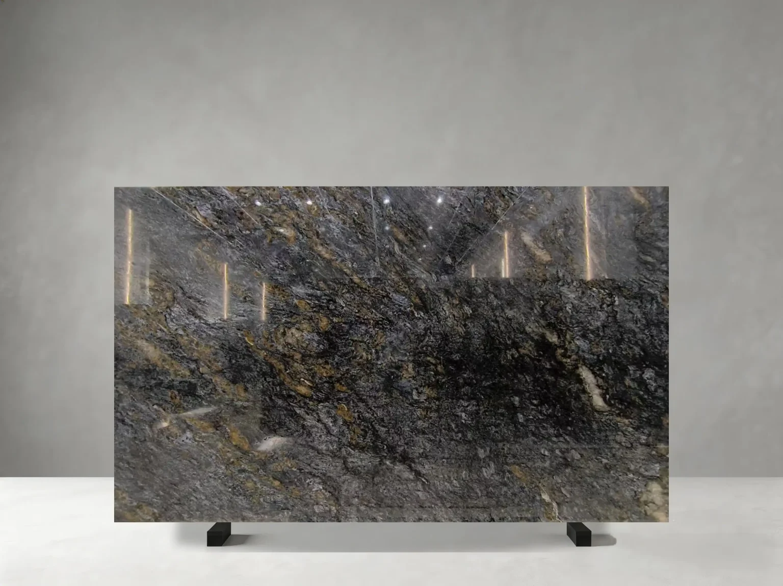 kozmus black granite slab with dark charcoal black and complex natural mineral pattern