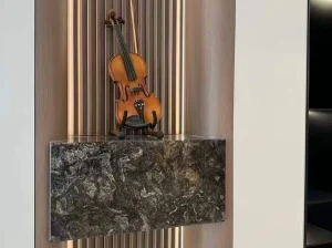 kozmus granite custom display console with dark grey and silver mineral texture