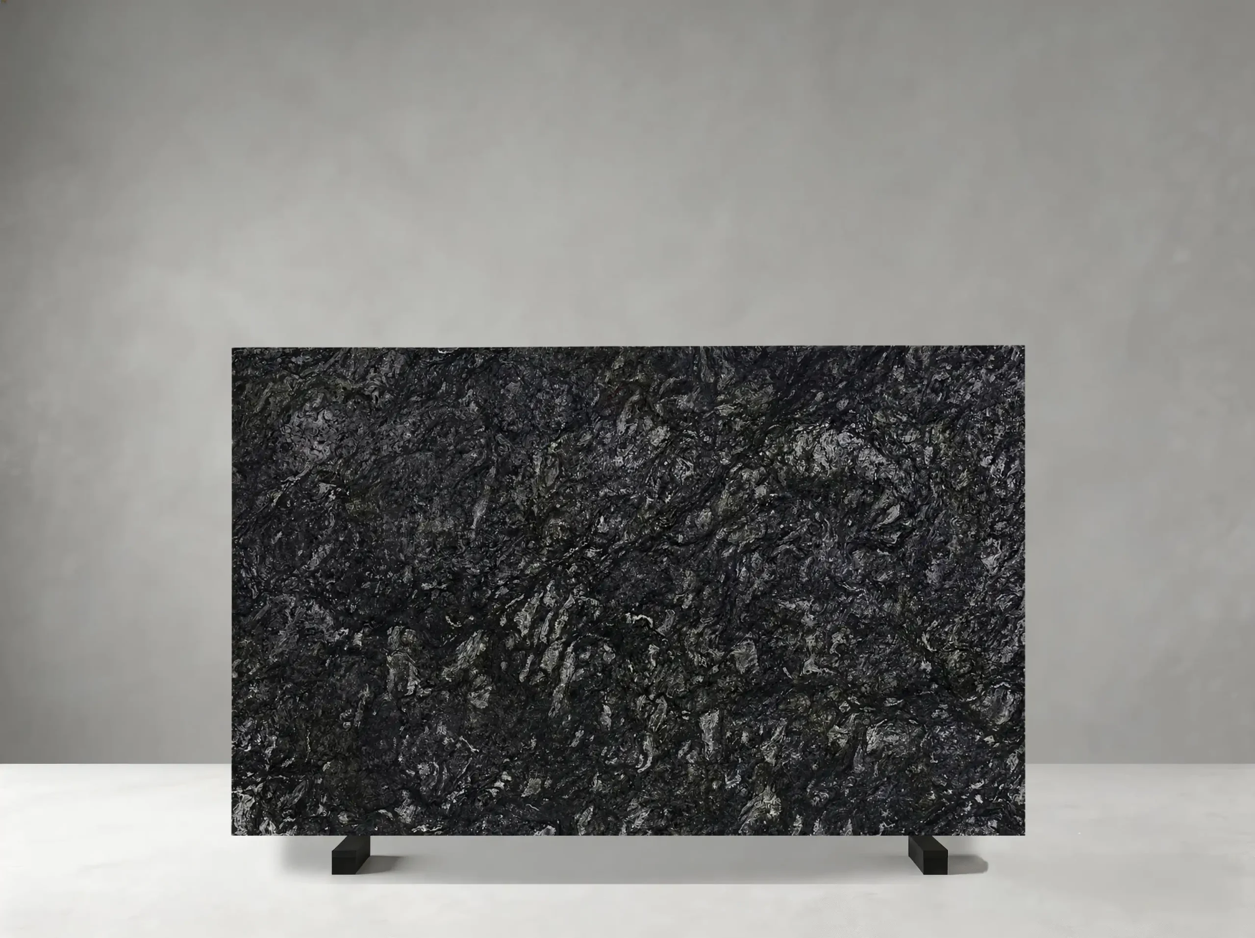 kozmus-granite-slab-dark-black-mineral-04.webp kozmus granite slab with dark black charcoal and silver mineral texture