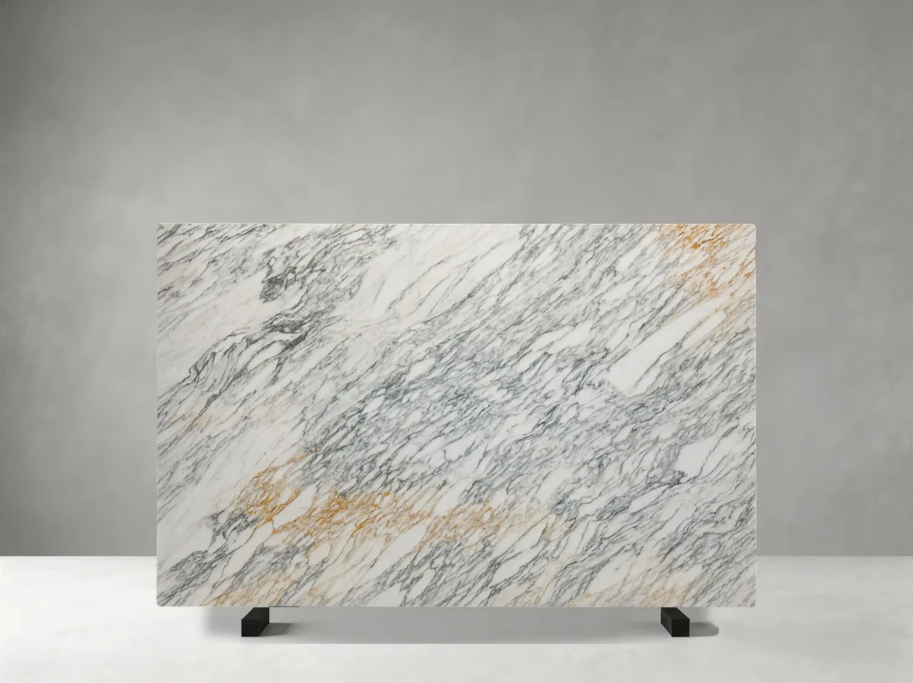Lasa Bianco Nuvolato Marble slab with dense grey veins and warm gold accents