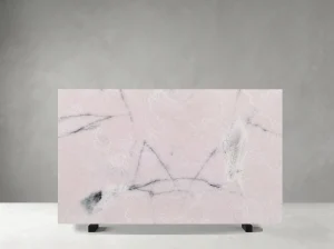 Polished Light Pink Onyx slab with pale pink crystalline areas and fine grey mineral veins