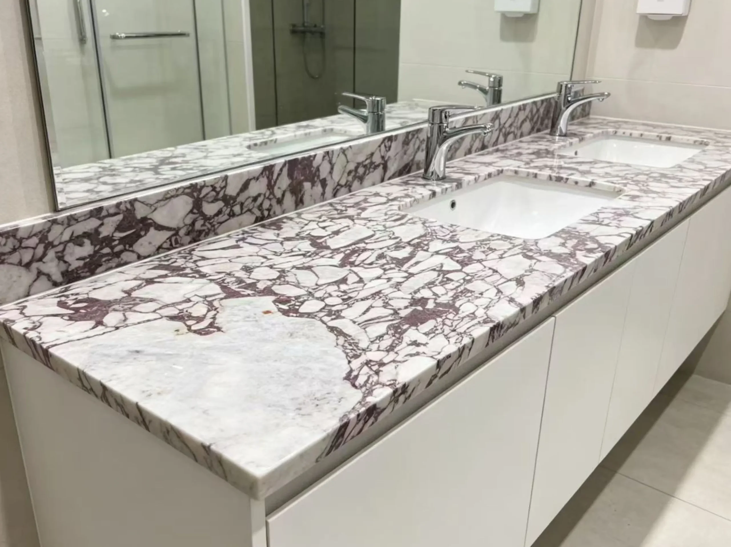 marmi-breccia-capraia-marble-bathroom-vanity-top-01.webp marmi breccia capraia marble bathroom vanity top with dark breccia veins