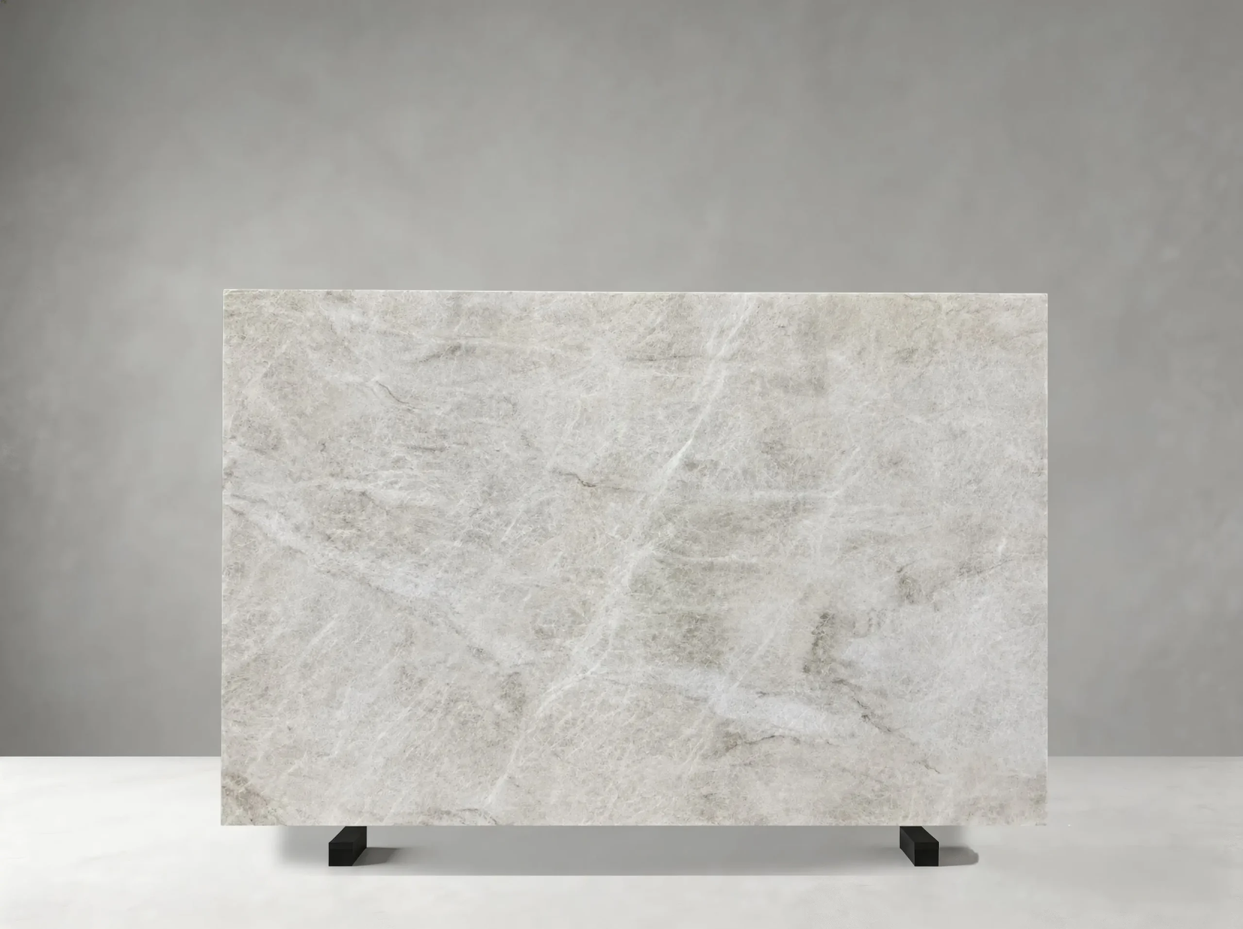 matira-quartzite-grey-slab-detail-01.webp Wooden Black Marble slab with wavy charcoal veining