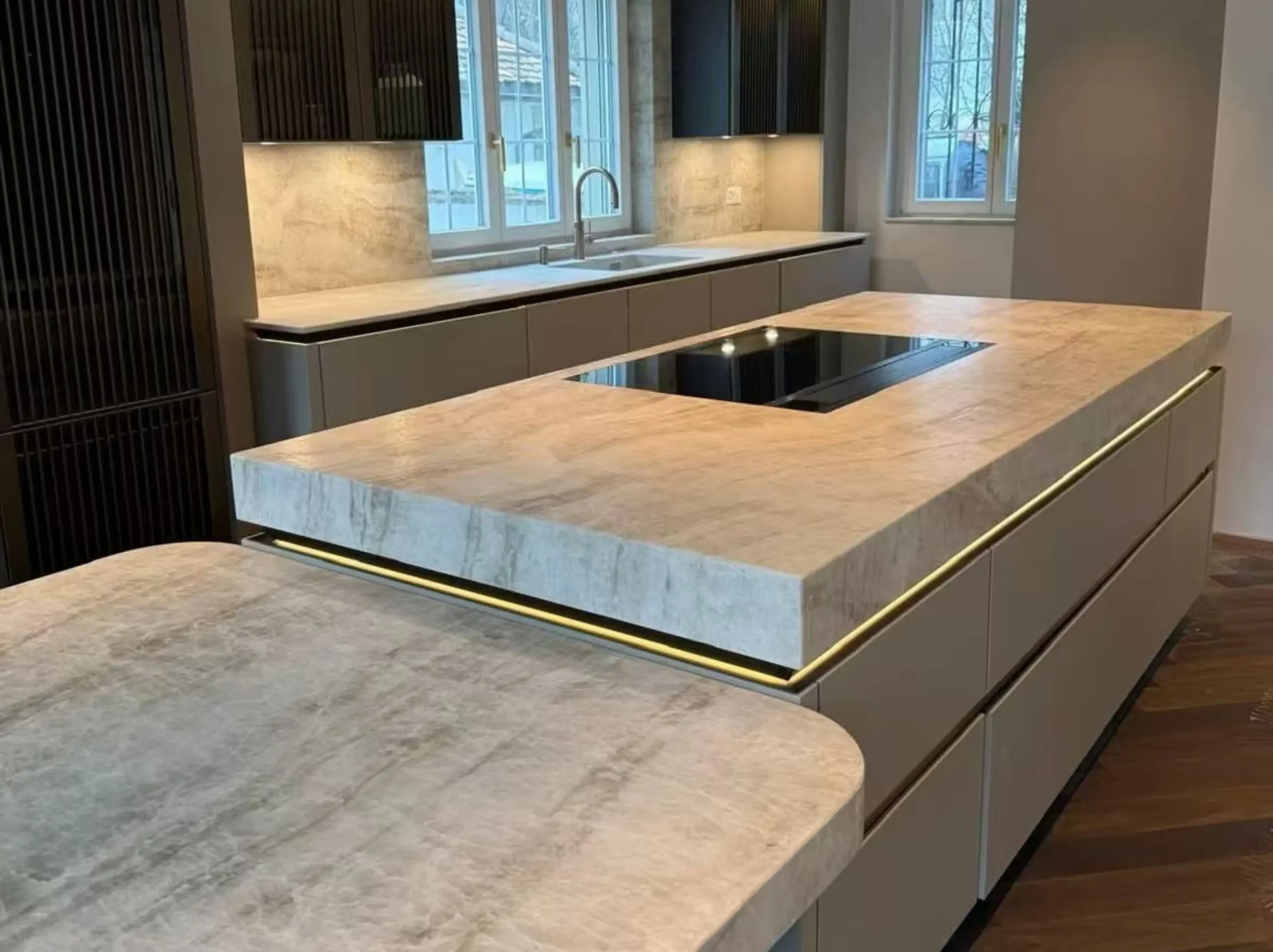matira-quartzite-large-format-wall-tiles.webp Wooden Black Marble dining table with flowing grey veins