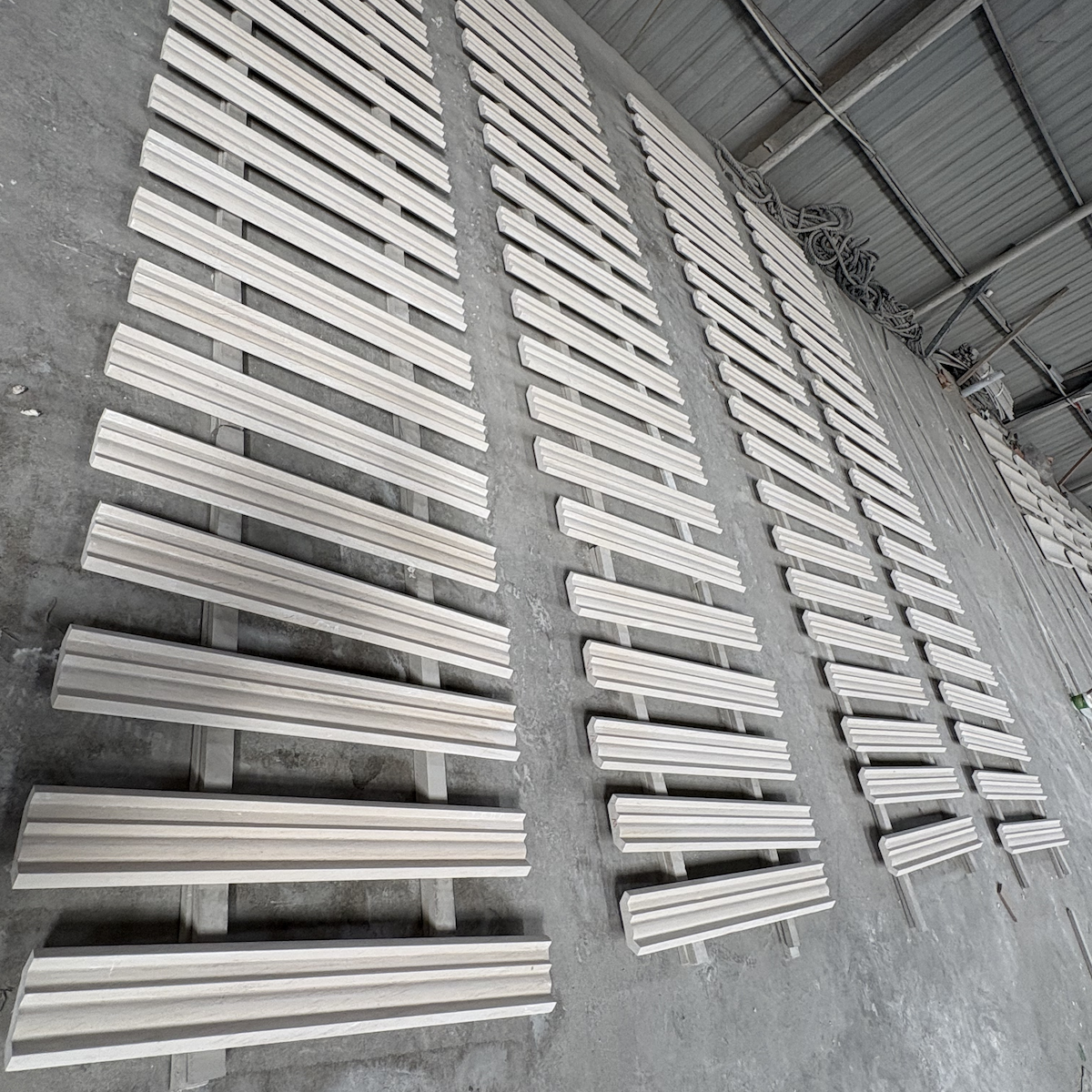 Custom fabrication of Moca Cream Limestone cornice in Show Stone workshop
