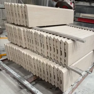 Stacked Moca Cream Limestone cornice pieces in Show Stone factory