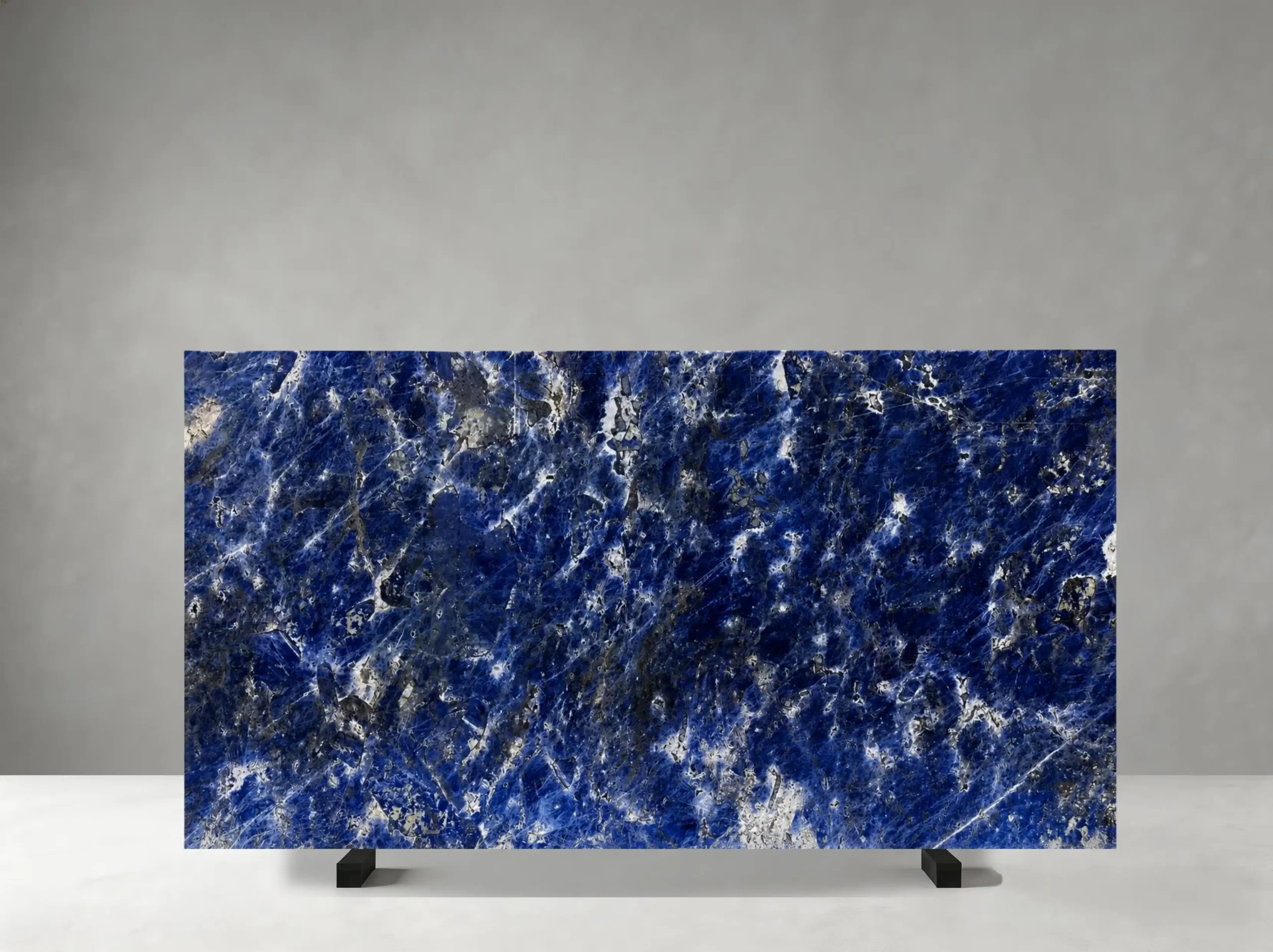 namibia-blue-classic-sodalite-slab-deep-cobalt-crystalline-05.webp namibia blue classic sodalite granite slab with deep cobalt blue and white grey crystalline pattern