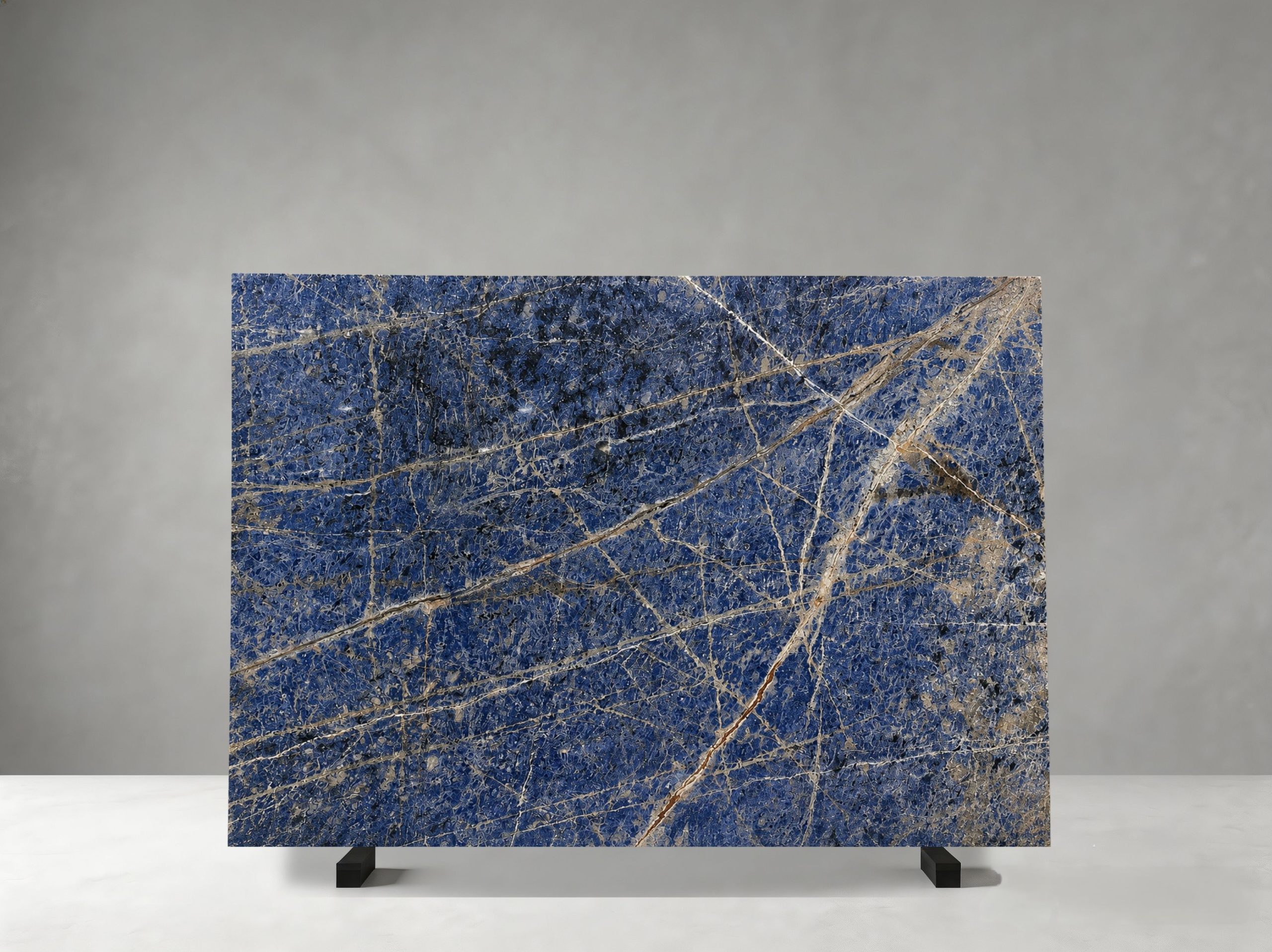 namibia-blue-sodalite-slab-blue-gold-veining-04.webp namibia blue sodalite granite slab with blue field and beige gold veining
