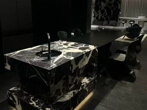 napoleon black marble kitchen island and bar counter with white breccia veins