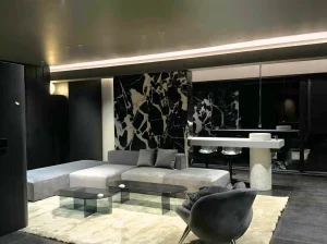 napoleon black marble living room feature wall with black base and bold white breccia veins