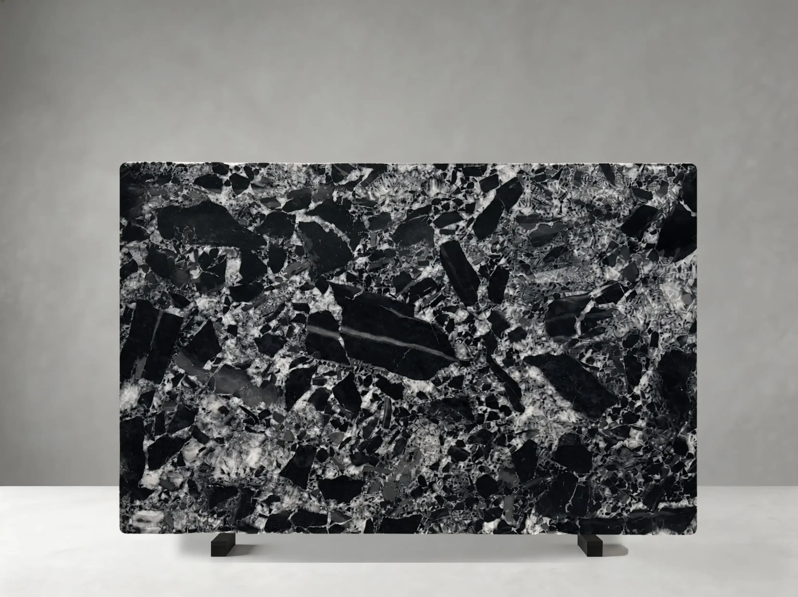 nepoleon-black-marble-slab-black-white-breccia-04.webp nepoleon black marble slab close up black white breccia texture for luxury interiors