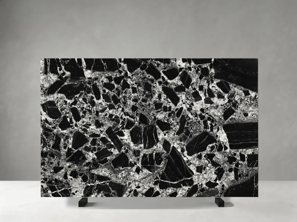 nepoleon black marble slab deep black background with bold white breccia pattern