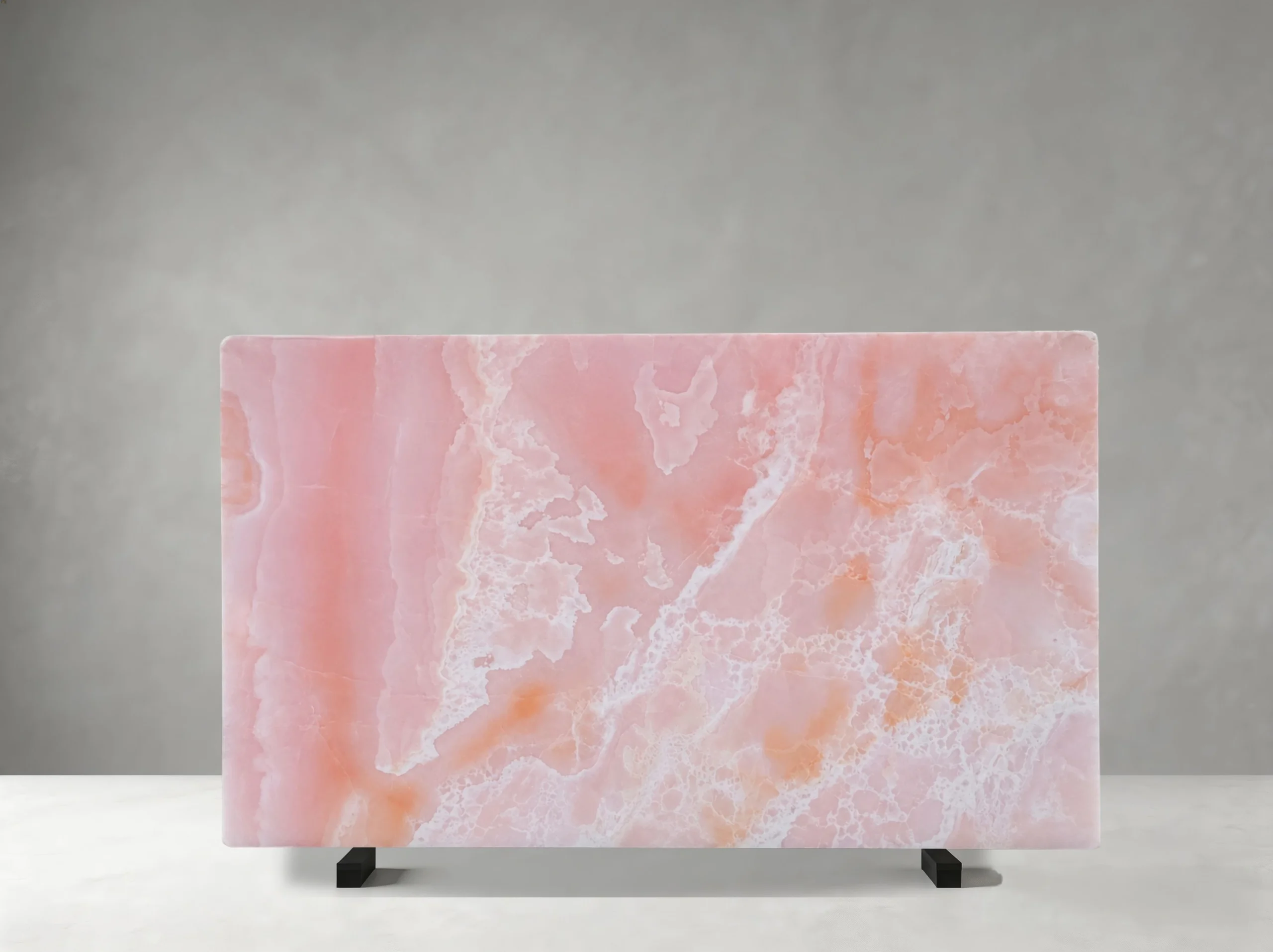 onice-rosso-slab-peach-crystalline-front-view-04.webp Front view of a polished Onice Rosso slab with rose-pink, peach, and white crystalline patterns