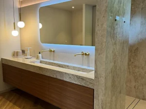 Perla Santana Quartzite bathroom vanity top and wall cladding in a luxury interior