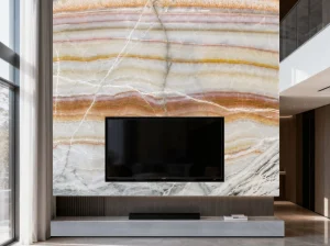 persian rainbow onyx tv wall panel with cream amber gold rose and grey layered mineral bands