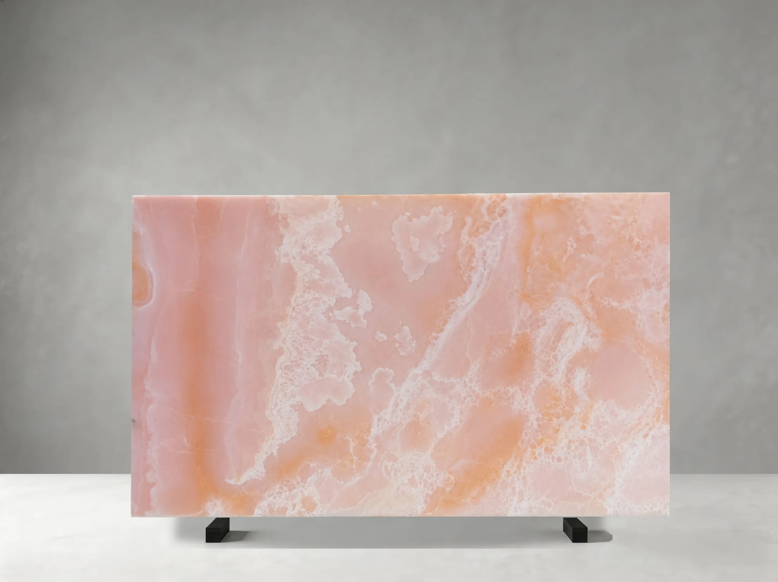 pink-onyx-slab-peach-white-pattern-front-view-05.webp Polished Pink Onyx slab with peach-pink tones and lace-like white crystalline formations