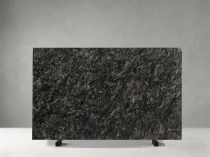 platinum black granite slab with dark grey directional mineral movement and subtle warm accents