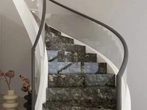 platinum gold granite curved staircase with dark grey silver and warm gold mineral movement