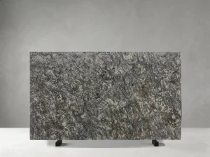 platinum gold granite slab with grey silver and warm gold brown mineral movement