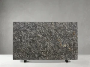 platinum gold granite slab with silver grey crystalline texture and gold brown accents