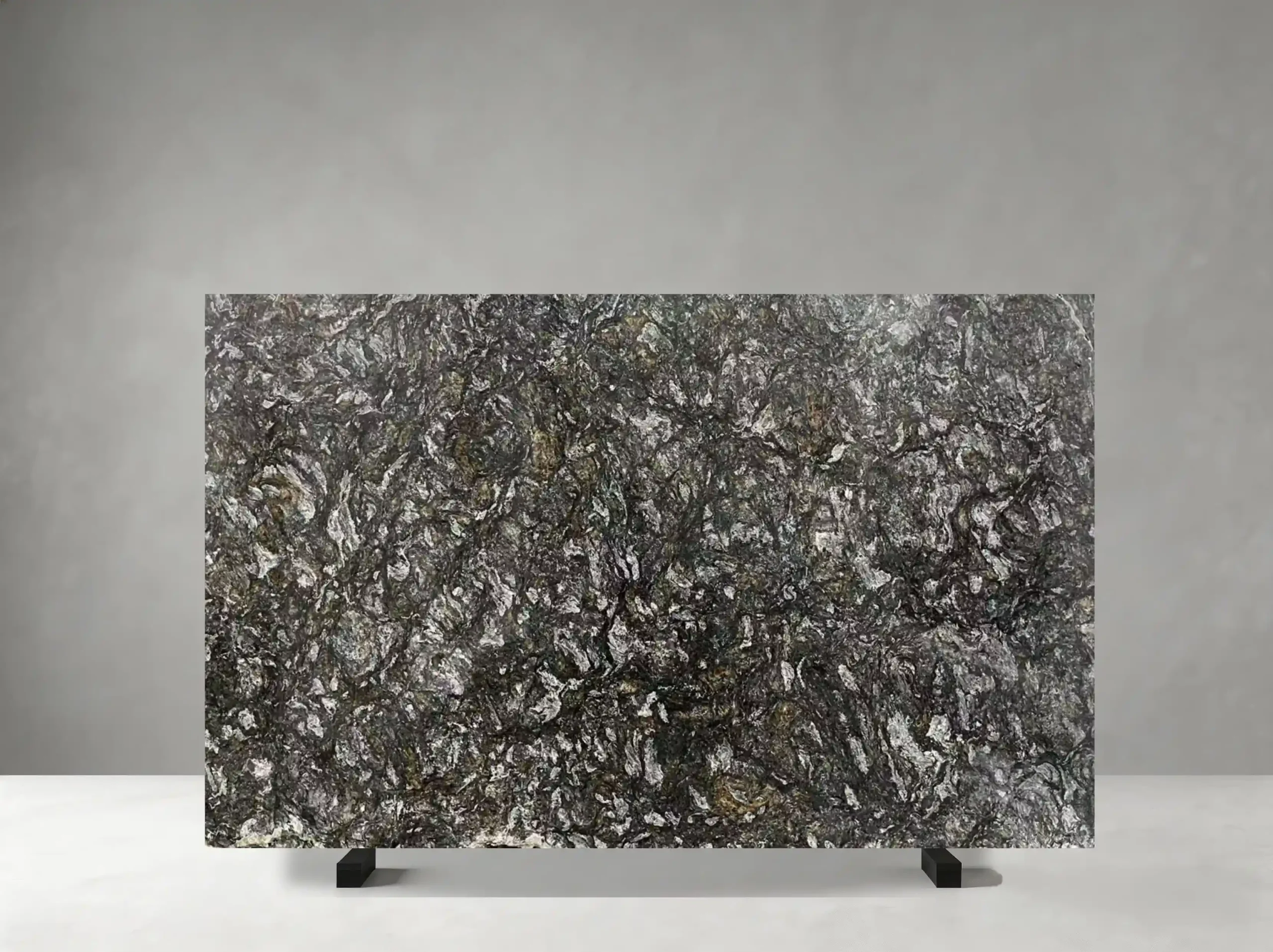 platinum-granite-slab-dark-silver-texture-05.webp platinum granite slab with dark charcoal grey and complex silver mineral texture