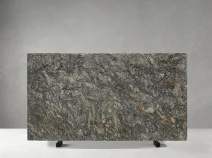 platinum granite slab with grey silver and warm bronze mineral movement
