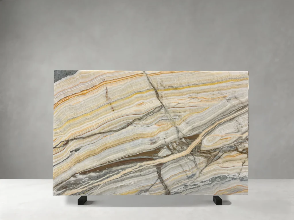 rainbow onyx slab with ivory cream honey orange grey and flowing layered veining