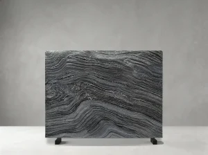 Rosewood Grain Black Marble slab with flowing dark wood-grain pattern