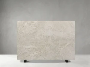 Taj Mahal Quartzite natural slab with warm ivory background and flowing beige veins