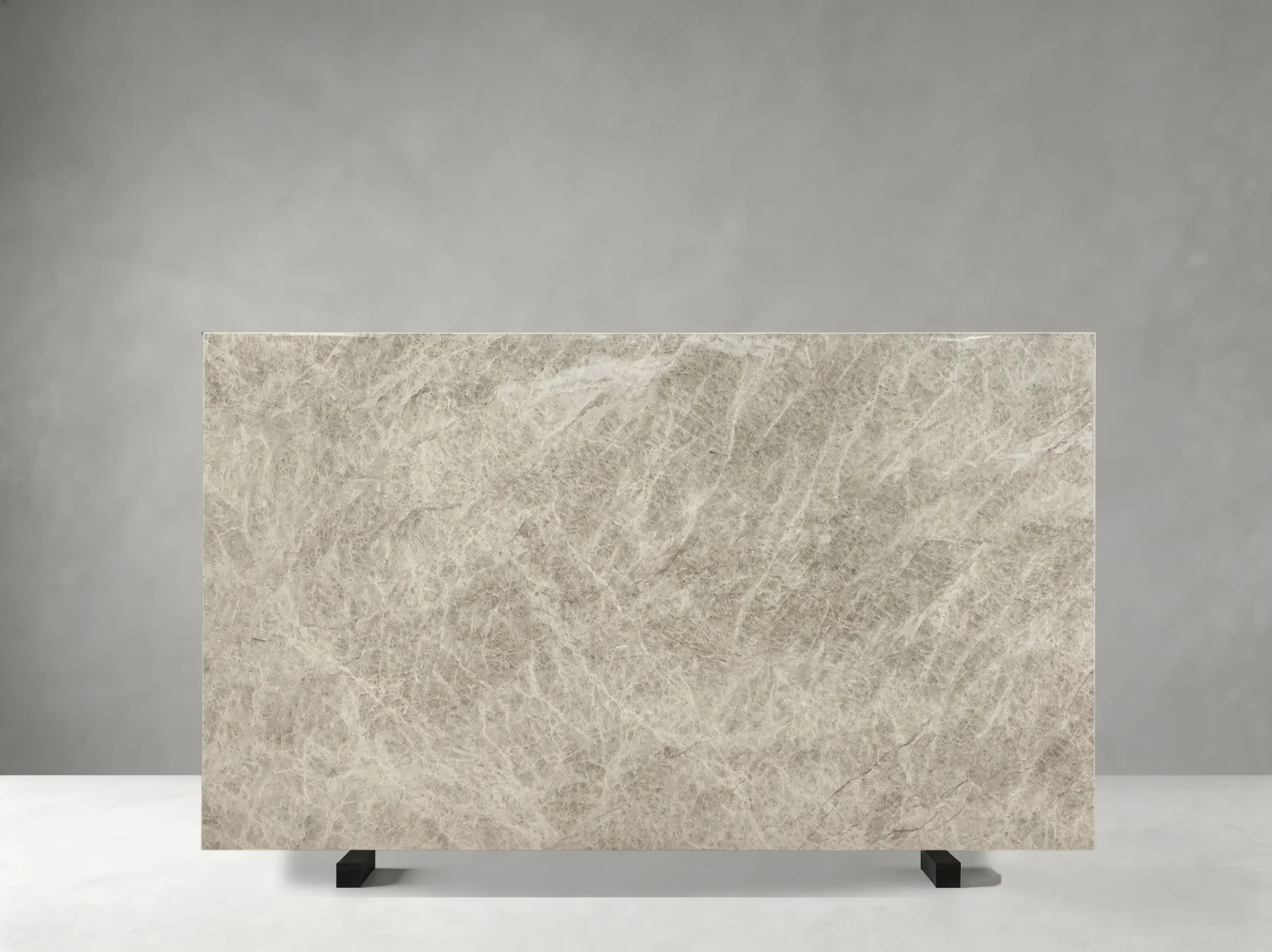 taj-mahal-white-quartzite-surface-detail.webp Taj Mahal White Quartzite surface detail with layered ivory and taupe mineral veins