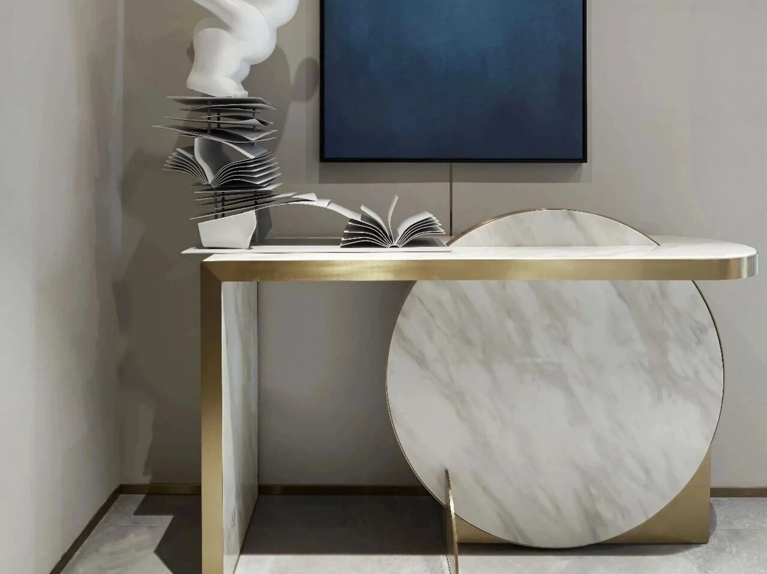 volakas-drama-white-marble-console-table.webp Custom Volakas Drama White Marble console table with circular stone panels and gold metal frame