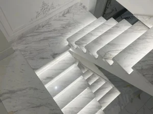 Illuminated Volakas Drama White Marble staircase with coordinated treads, risers and landing