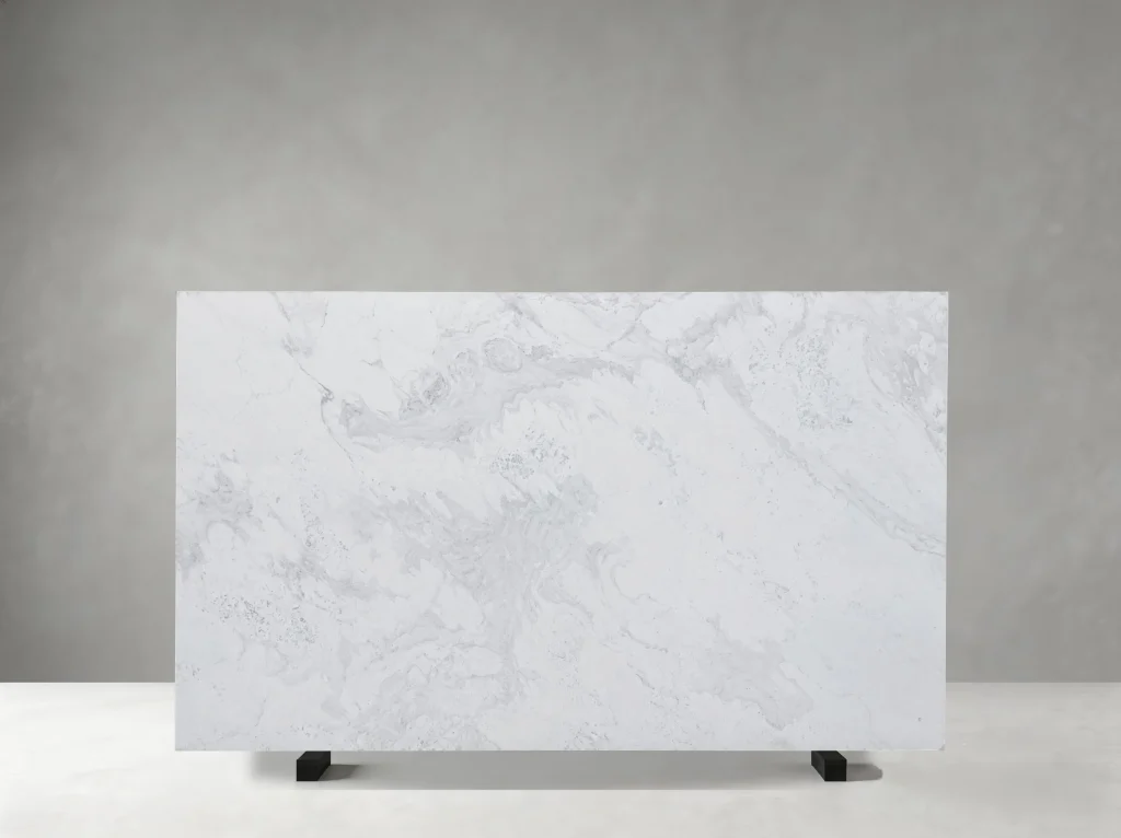 Front view of Volakas Drama White Marble slab with soft cloudy and flowing grey veining