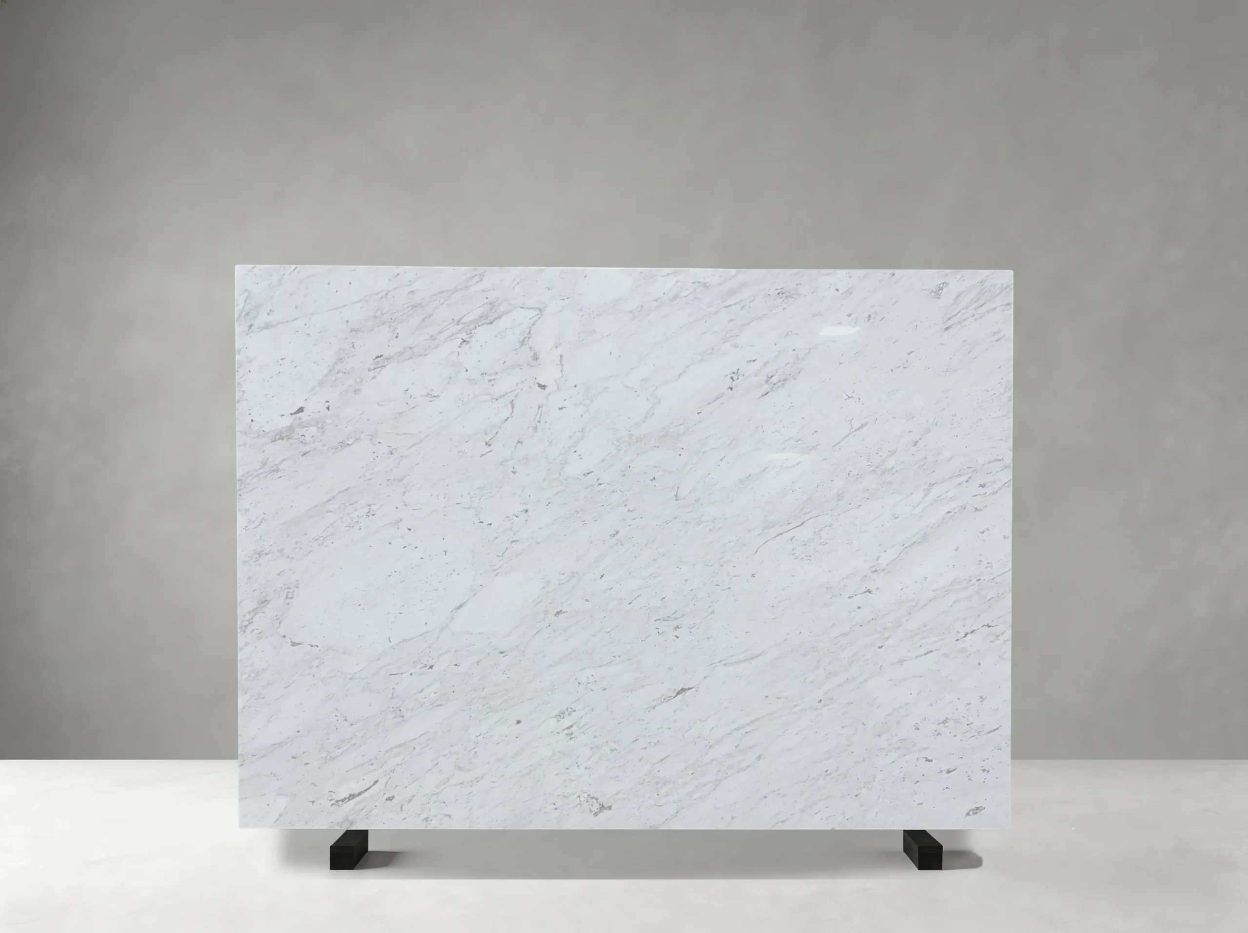 volakas-drama-white-marble-slab-linear-grey-veining.webp Front view of Volakas Drama White Marble slab with fine diagonal linear grey veining