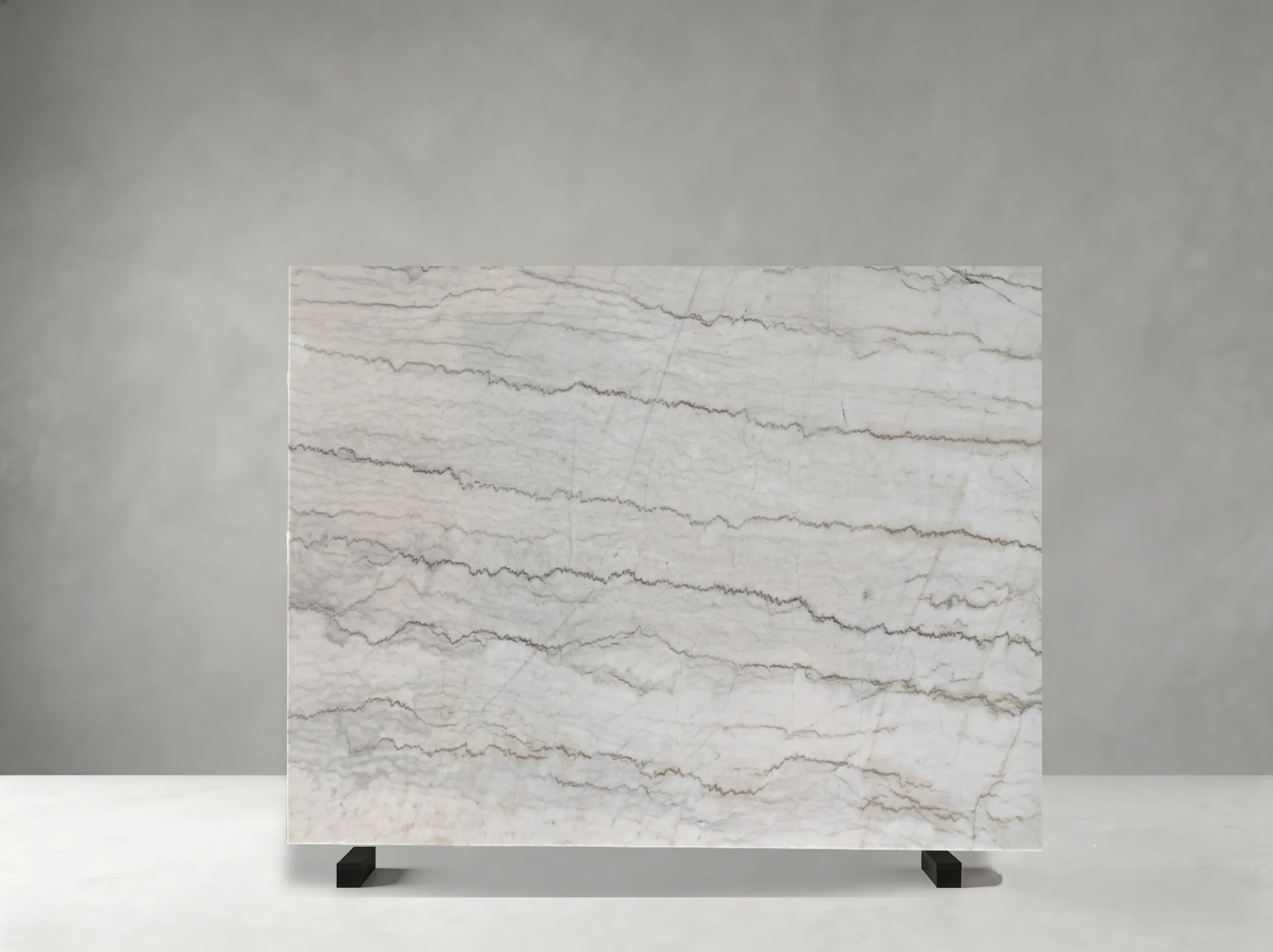 white-guangxi-marble-polished-slab-02.webp White Guangxi Marble slab with fine flowing grey-beige veins