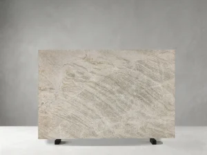 Front view of White Matira Quartzite slab with ivory-white tones and pale grey crystalline veining