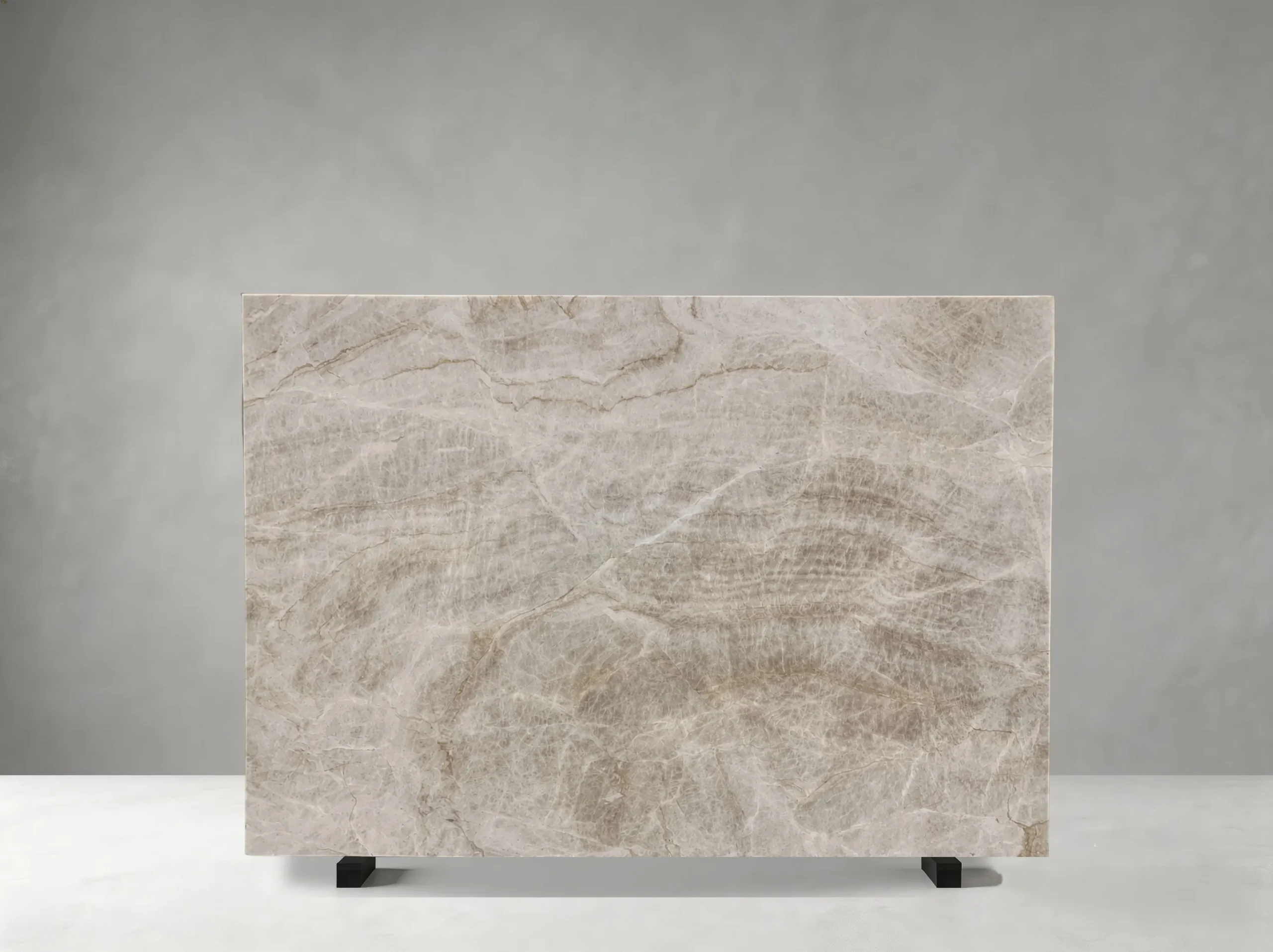white-matira-quartzite-natural-slab-02.webp Natural White Matira Quartzite slab with layered grey veins and soft taupe mineral patterns