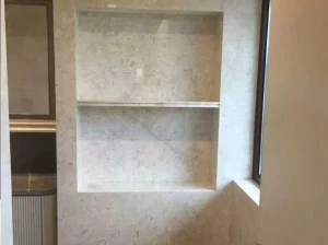 White Rose Marble wall cladding with two custom recessed niches